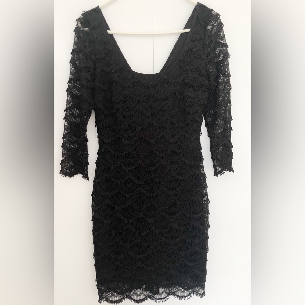 Guess 3/4 length sleeve black lace knee length dress with gold zipper. Size 6